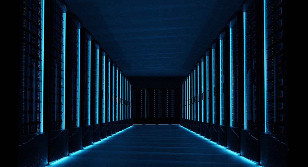 A dark hallway with blue lights in the background.